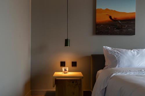 Katil atau katil-katil dalam bilik di Wake BioHotel