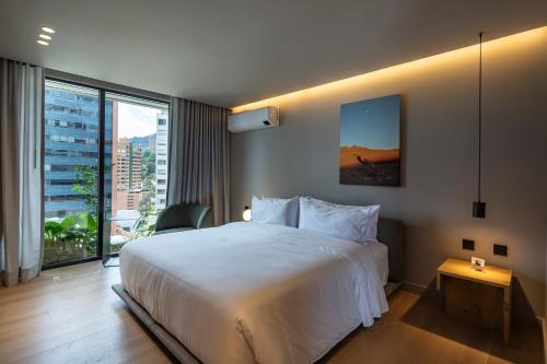 Katil atau katil-katil dalam bilik di Wake BioHotel