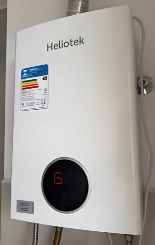 a white box with a helipack on it at Apartamento inteiro com vaga, varanda e piscina in Cotia