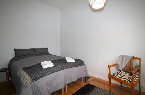 Ένα ή περισσότερα κρεβάτια σε δωμάτιο στο Central Apartment for 4