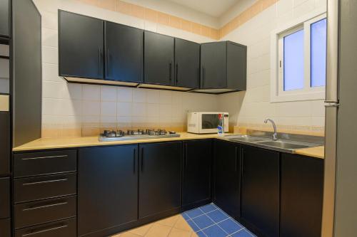 Køkken eller tekøkken på شقق درة العروس