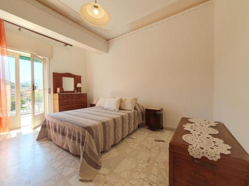 Postel nebo postele na pokoji v ubytování Apartment Camalù by Interhome