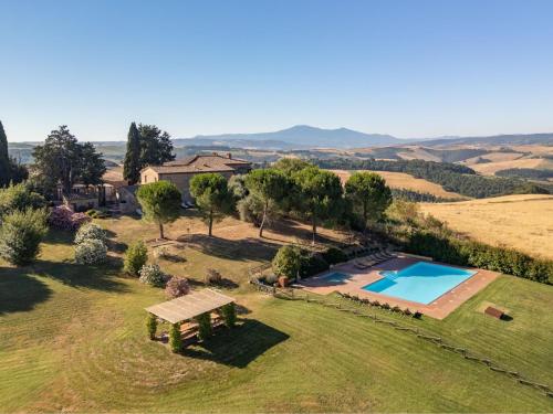 an aerial view of a villa with a swimming pool at Apartment Asciano by Interhome in Vergelle