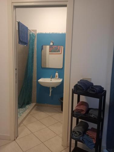 a bathroom with a sink and a mirror at Villa Voltina in Livorno