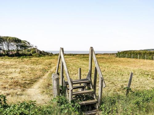 an old gate in the middle of a field at Holiday Home Frösakull by Interhome in Frösakull