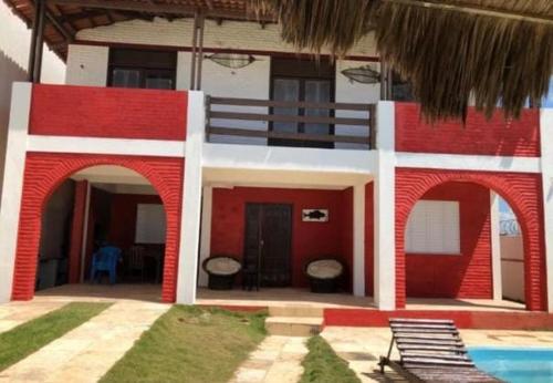 Kolam renang di atau dekat dengan Casa de Praia Pé na Areia