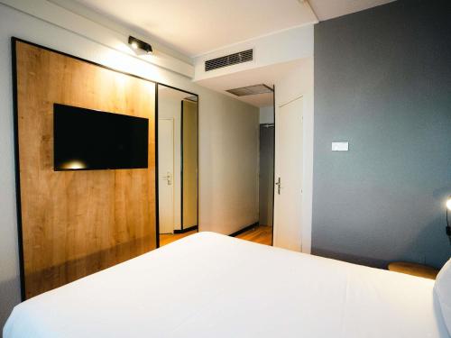 Ibis Valladolidにあるテレビまたはエンターテインメントセンター