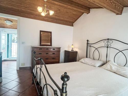 Ένα ή περισσότερα κρεβάτια σε δωμάτιο στο Holiday Home Gionni by Interhome