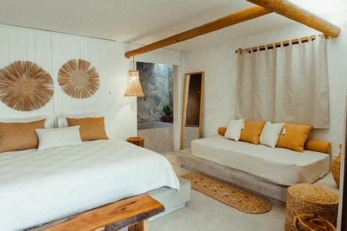 Postel nebo postele na pokoji v ubytování Kalit Hotel