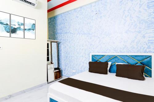 Postel nebo postele na pokoji v ubytování Hotel Ranjana Diamond