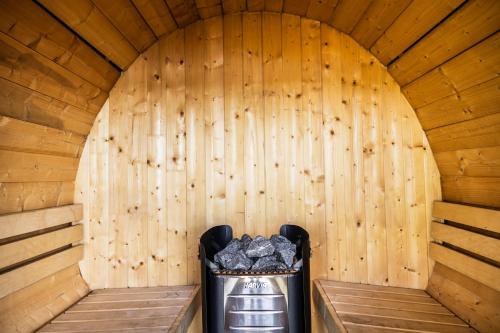 a inside of a sauna with a trash can at Sunken Escapes Glamping Unit #2 in New Minas