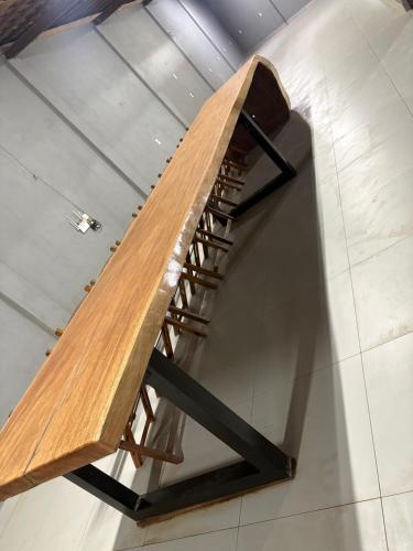 a wooden stairwell in a building with a wooden at Chalé da Serra in Araruna