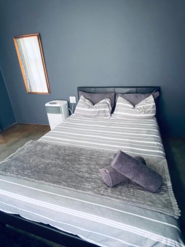 Katil atau katil-katil dalam bilik di Ha-Dzibs backpackers accommodation