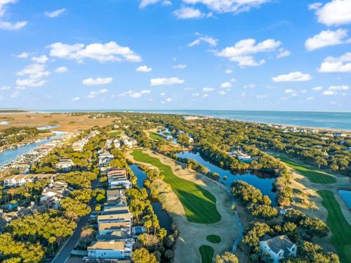 an aerial view of the golf course at the ocean villas at New Listing! Moorings 510 - Yacht View Serenity! in Isle of Palms