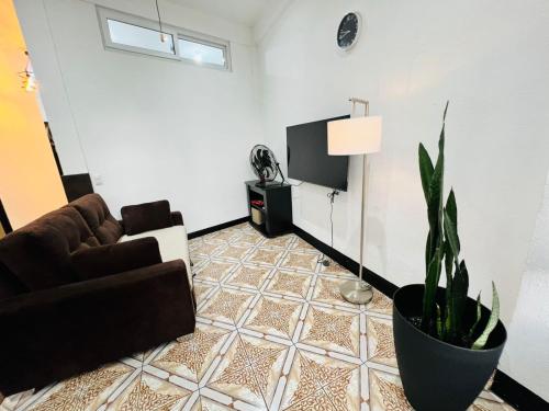 Μια τηλεόραση ή/και κέντρο ψυχαγωγίας στο Apartamento en la zona viva con parqueo exclusivo