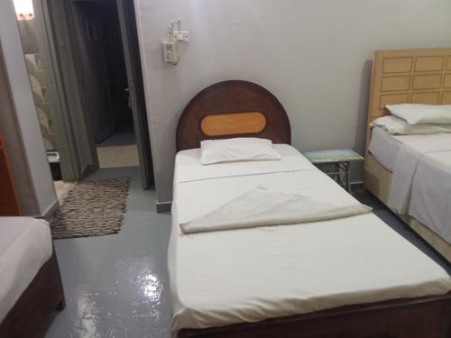 Bob Marley Peace hotel luxorにあるベッド