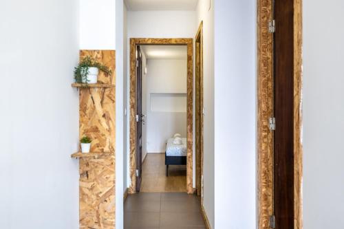 a hallway with a mirror in a room at Casa da Legua -Panoramic Ocean View w Terrace in Pataias