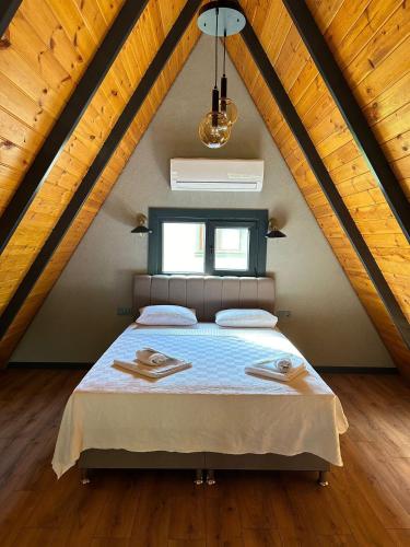 Ένα ή περισσότερα κρεβάτια σε δωμάτιο στο Finymoco