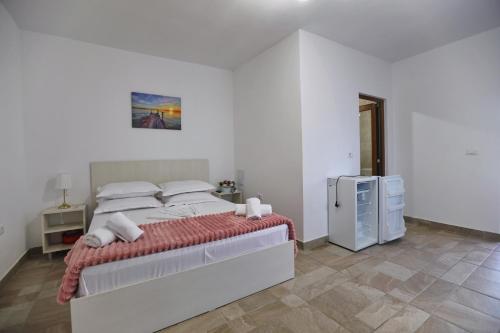 Llit o llits en una habitació de Casa Selina