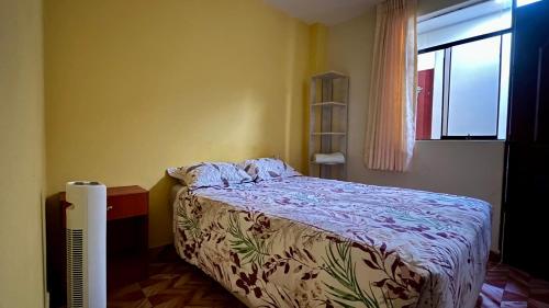 Ένα ή περισσότερα κρεβάτια σε δωμάτιο στο Paracas Ayni