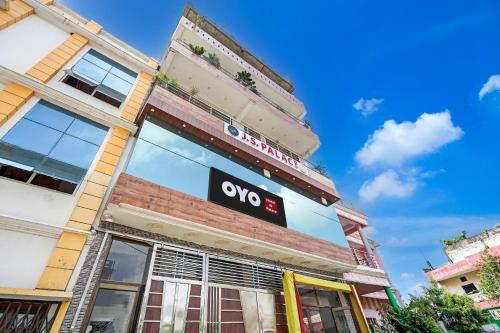 a building with an ovo sign on it at Hotel O JS Palace in Gorakhpur