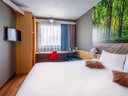 Łóżko lub łóżka w pokoju w obiekcie Ibis Katowice - Zabrze