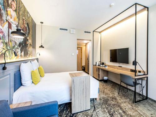 TV a/nebo společenská místnost v ubytování Mercure Wrocław Centrum