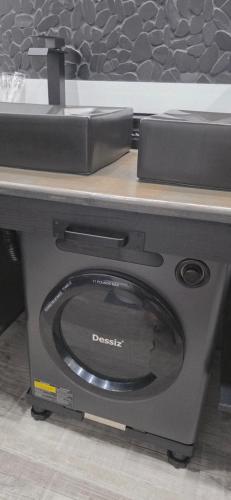 a table with a dockedounter with a toaster at Staycation Oasis! a unique Experience! Heated pool open until October 31st in Easton