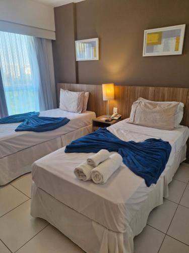 Кровать или кровати в номере Rio Centro Stay 1