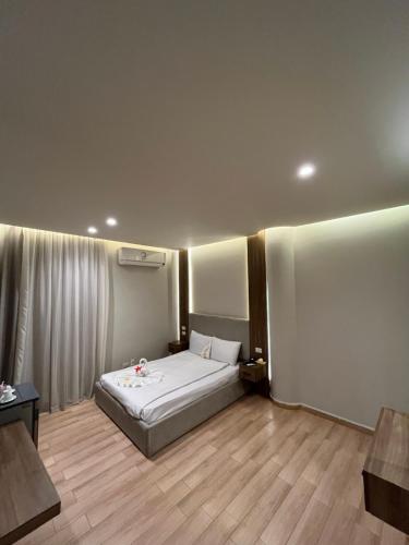 Ένα ή περισσότερα κρεβάτια σε δωμάτιο στο Pyramids Hills Guest House