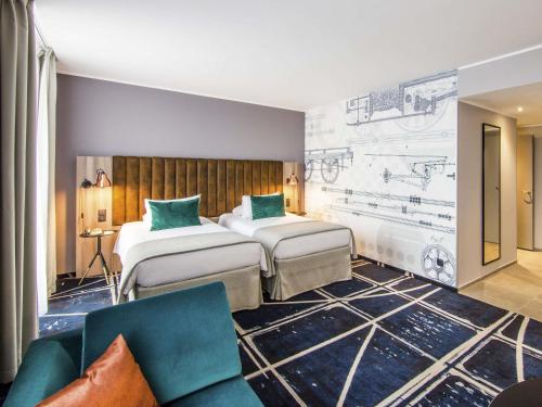 Un ou plusieurs lits dans un hébergement de l'établissement Hotel Mercure Poznań Centrum