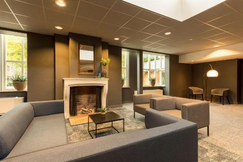 Χώρος καθιστικού στο NH Eindhoven Conference Centre Koningshof