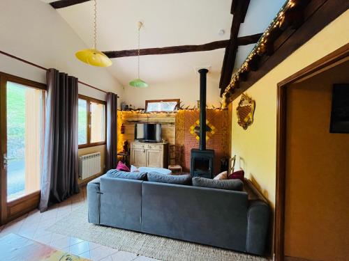 O zonă de relaxare la Charmant logement dans village de montagne