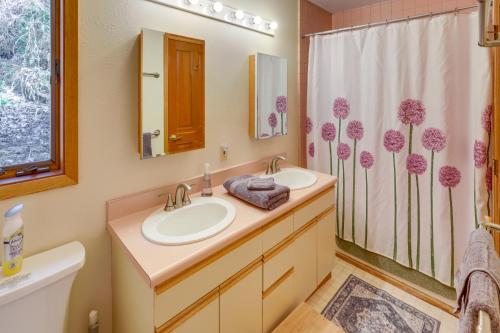a bathroom with a sink and a shower at 9 Mi to Mendenhall Glacier Waterfront Juneau Home in Juneau International Airport