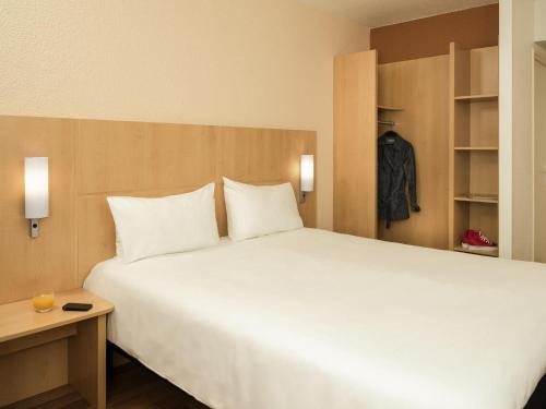 Кровать или кровати в номере ibis Nogent Sur Marne RÉNOVÉ EN 2025