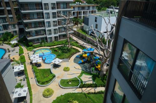 an aerial view of a playground in a city at The Diamond In City Luxury Suites By ZENORA Living in Accra
