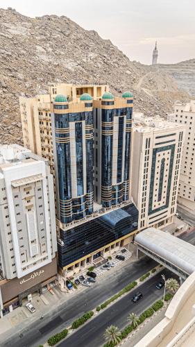 an aerial view of a building in the desert at Masar Al Aziziyah Hotel in Makkah