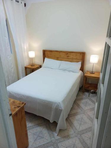 Ένα ή περισσότερα κρεβάτια σε δωμάτιο στο Casatata