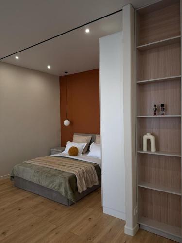 Ένα ή περισσότερα κρεβάτια σε δωμάτιο στο Comfort & StyLe & BEST APARTMENT