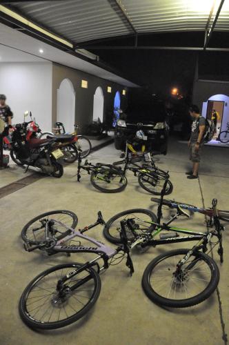 a group of bikes parked in a garage at Banana Resort Sadao in Sadao