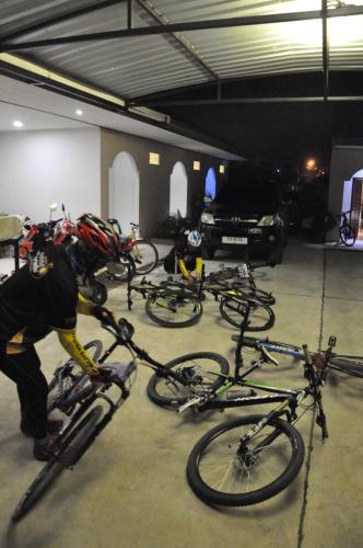 a group of bikes parked in a garage at Banana Resort Sadao in Sadao