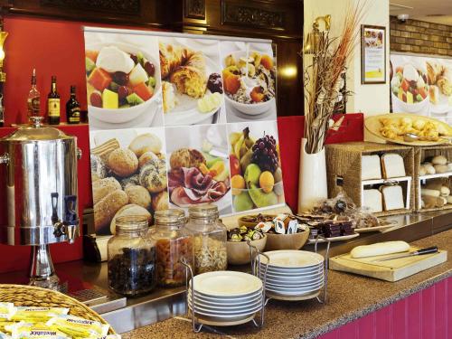 a buffet with many different types of food on display at ibis Hull City Centre in Hull