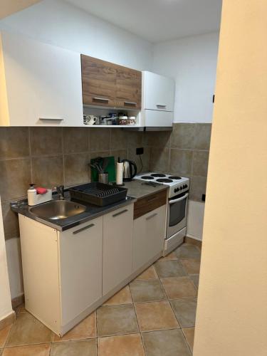 Apartments Donにあるキッチンまたは簡易キッチン