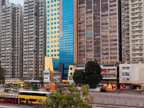 a view of a city with tall buildings at ibis Hong Kong North Point in Hong Kong