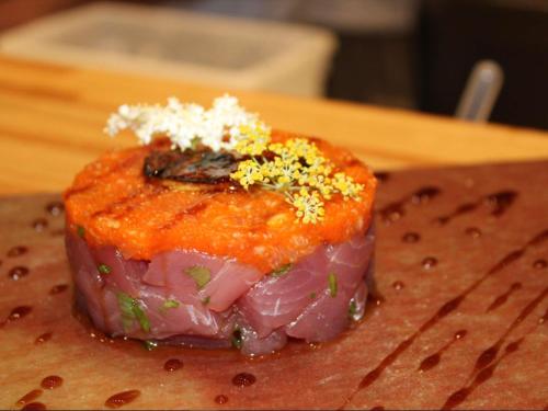a piece of food sitting on top of a table at Mercure Belo Horizonte Lourdes in Belo Horizonte