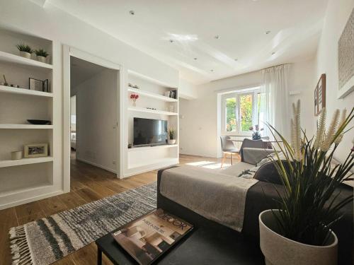 Μια τηλεόραση ή/και κέντρο ψυχαγωγίας στο Piramide Elegance Apartment