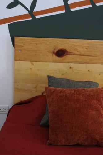 Ένα ή περισσότερα κρεβάτια σε δωμάτιο στο Habitaciones en Casa Casiopea