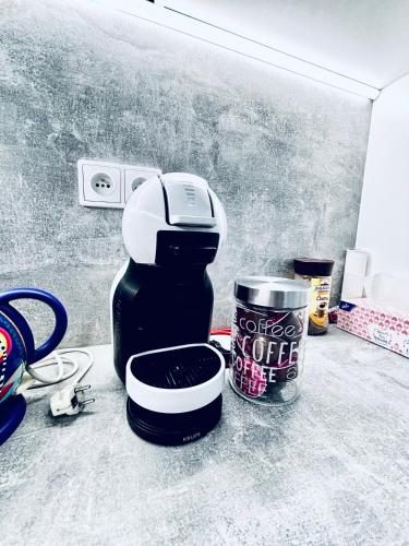 a coffee maker sitting on top of a counter at Apartmán u Louckého kláštera 2 plus KK in Znojmo
