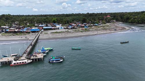 a group of boats are docked at a dock at SURF HOUSE ESTILO LIBRE in Buenaventura