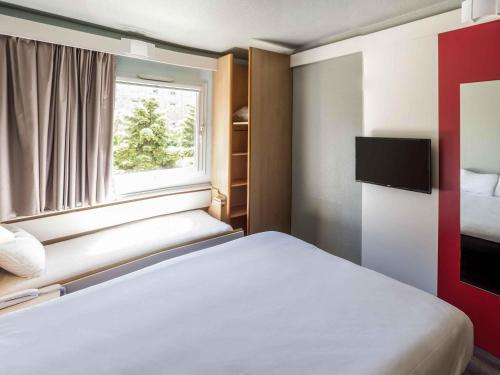 Postel nebo postele na pokoji v ubytování Ibis Salamanca